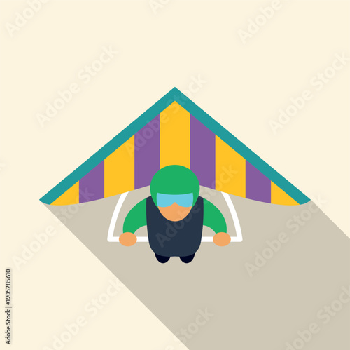 Hang gliding sportsman navigating the air with a colorful wing, viewed from above