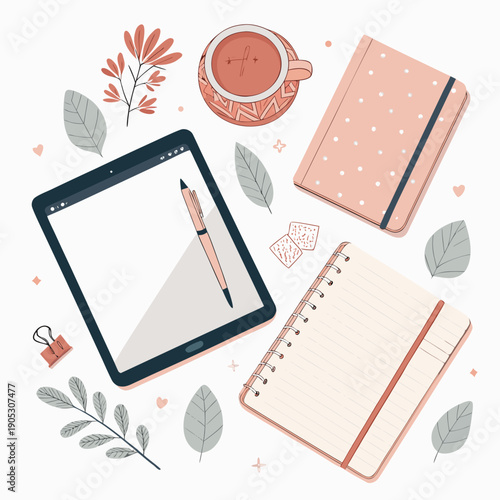 A tablet with a stylus lies next to a notebook and a cup of coffee surrounded by leaves and decorative elements on a flat surface viewed from directly above.