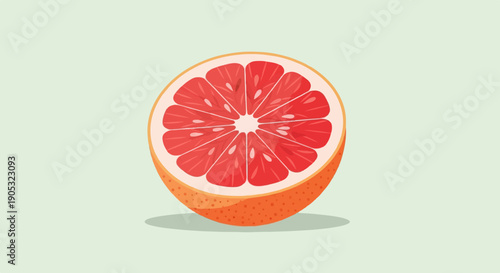Freshly sliced red grapefruit on a light green background with shadow