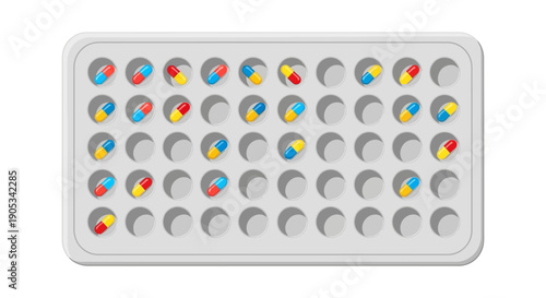 Colorful Pills Arranged in a Rectangular Tray with Multiple Compartments