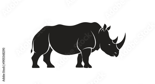 Silhouette of a powerful rhinoceros standing majestically 1.