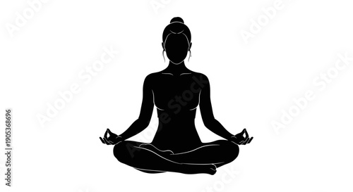 Silhouette of a Woman Meditating in Lotus Pose.