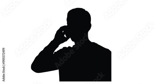 Silhouette of a man talking on a mobile phone against a white background