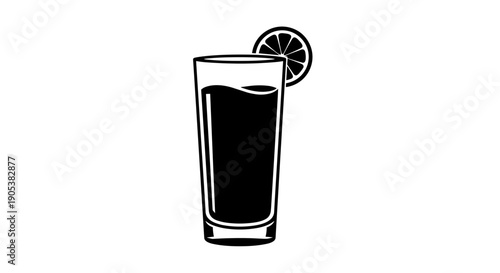Tall glass of dark beverage with lemon slice garnish.