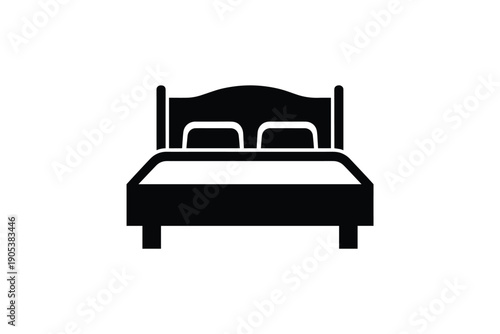 Double bed with headboard and pillows, representing comfort, rest, and sleep in bedroom setting