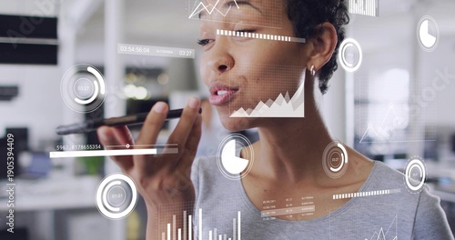 Фотография Holding woman speaking into smartphone in office, wearing gray top and hoop earr