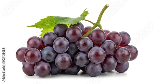 Fresh, ripe dark red grapes in a vibrant bunch with a green leaf, isolated on white, perfect for healthy eating