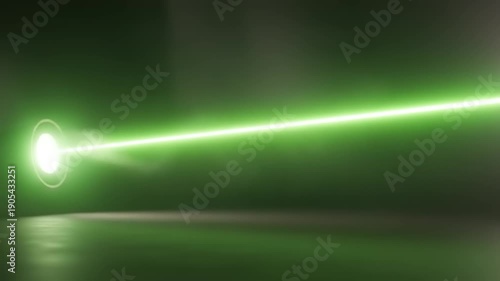 Bright Green Laser Beam Emitting from a Device in a Dark Room.