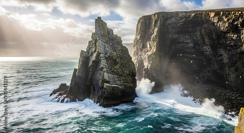 Jagged rocky sea stacks battered by crashing ocean waves and circling birds water