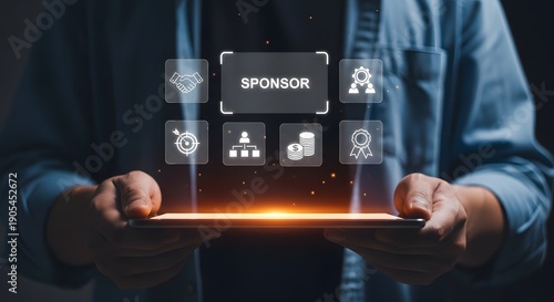 A person holding a tablet displaying sponsorship and digital marketing icons for branding