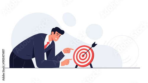 Businessman pointing at target board with arrow, strategy and goal achievement concept