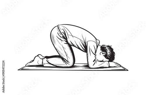 A person in a prayer pose is bowing with their head to the ground on a mat