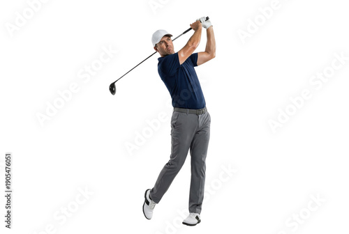 Full length male golfer in navy polo and gray pants swinging driver golf club, isolated on white background