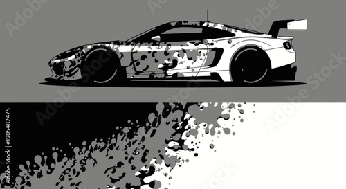 Sleek monochrome race car in motion with splatter graphic and dynamic design.