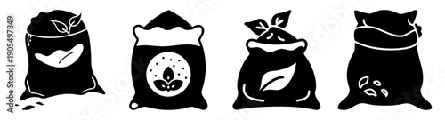 Set of 4 vector soil fertilizer bags icons with plant growth and eco farming symbols isolated on white background
