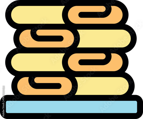 Soft, rolled towels neatly stacked and ready for use in bathroom or spa