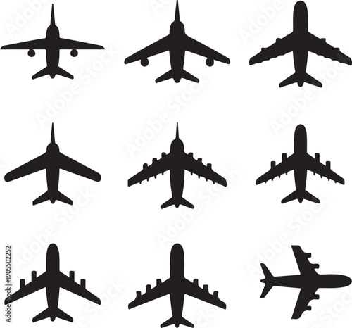 Silhouettes of airplanes in various flying positions and angles