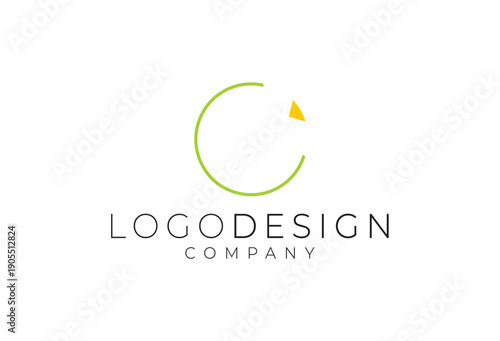 Modern minimalist logo design featuring a dynamic green incomplete circle with a bright yellow accent, symbolizing innovation and completeness for a contemporary creative company's brand identity