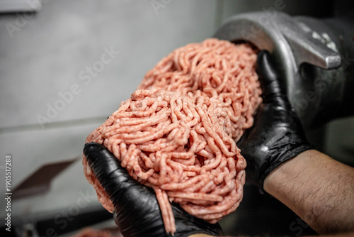 Fresh Minced Meat From Grinder In Hands