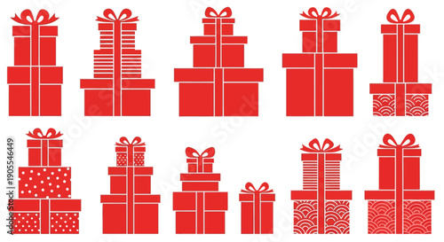 Collection of various stacked gift boxes with red ribbon bows and patterned wrapping paper for holiday celebrations and special occasions