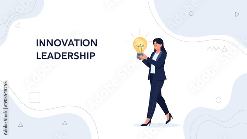 Businesswoman holding a glowing light bulb representing innovation and leadership