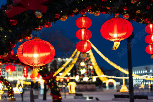 Russian city square at night decorated with chinese red lanterns. Chinese New Year decorations in Blagoveshchensk, Russia