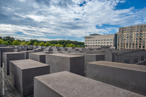 Berlin, germany, august 12, 2023. Memorial to the murdered jews of europe in berlin: geometric field of concrete stelae forming a solemn, contemplative urban maze