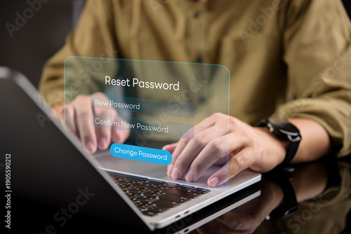 Man hands typing on laptop with virtual password reset interface. Concept of changing new password, account recovery, security update, and digital identity protection.