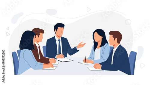 Business meeting with diverse team discussing strategy around a table.