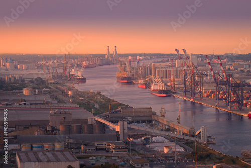 Wallpaper Mural Aerial view of industrial and port area of Ravenna,production district is made up of a chemical and petrochemical pole, thermoelectric and metallurgical plants at sunset Torontodigital.ca