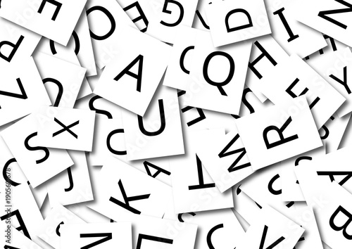 Scattered alphabet letter cards symbolizing language,
