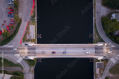 Wallpaper Mural Birds view of a cars  driving on a bridge over the water, The Ravenna Mobile Bridge, connects Via Romea Nord to the Pala De Andrè, Candiano canal, Ravenna,Italy Torontodigital.ca