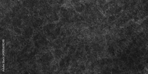 Dark charcoal grunge wall texture background. Dark black rough grunge surface with smoke edge. Black texture chalk board and black board.