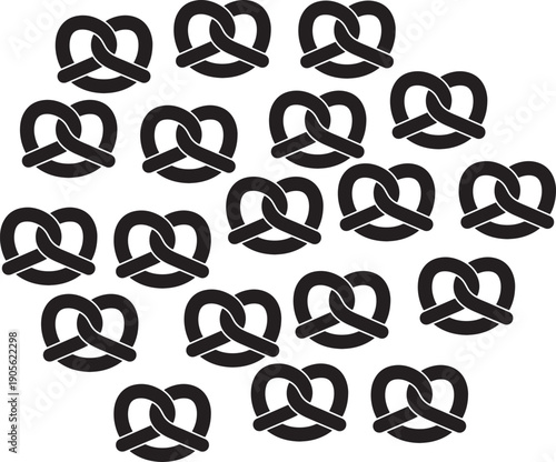 Black and white silhouette of multiple delicious pretzels scattered on a plain background
