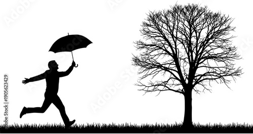 Silhouette of a man running with an umbrella across a grassy field toward a large, leafless winter tree under an open sky.