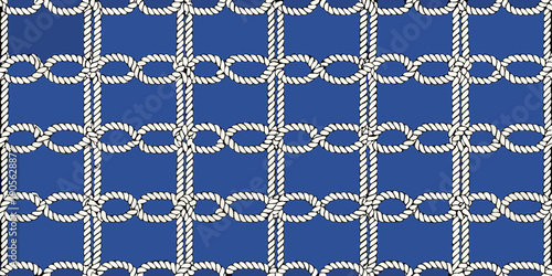 Seamless pattern of knotted white ropes against a deep blue background