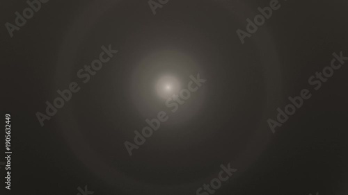 Concentric circles radiate inward, creating a visually calming and soft gradient
