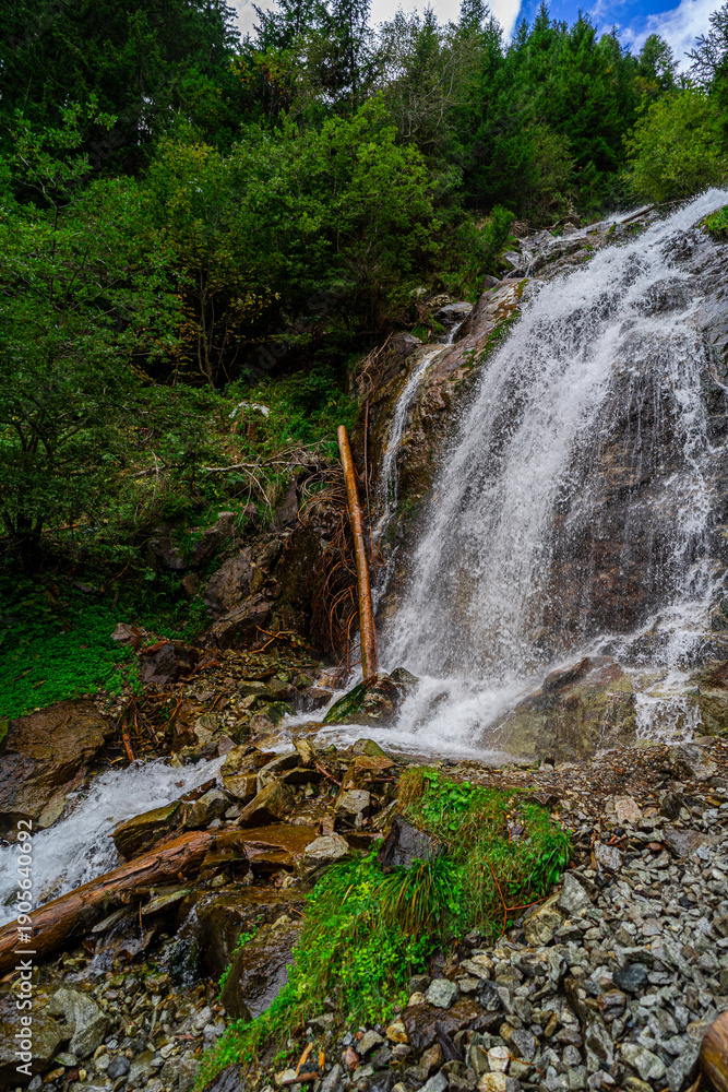 Obraz premium Hiking Trail to the Egger Waterfalls in the Antholz Valley South Tyrol in autumn 2025