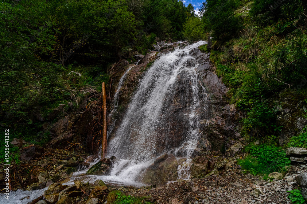 Obraz premium Hiking Trail to the Egger Waterfalls in the Antholz Valley South Tyrol in autumn 2025