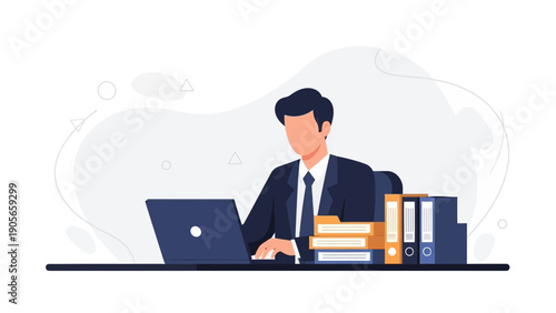 Businessman working on laptop at office desk with files and binders