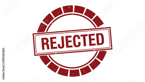 Rejected Stamp: A close-up shot of a red rejected rubber stamp.