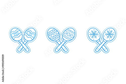 Three pairs of crossed maracas are displayed in a row against a black background. Each pair features a unique blue and white pattern including snowflakes and geometric shapes.
