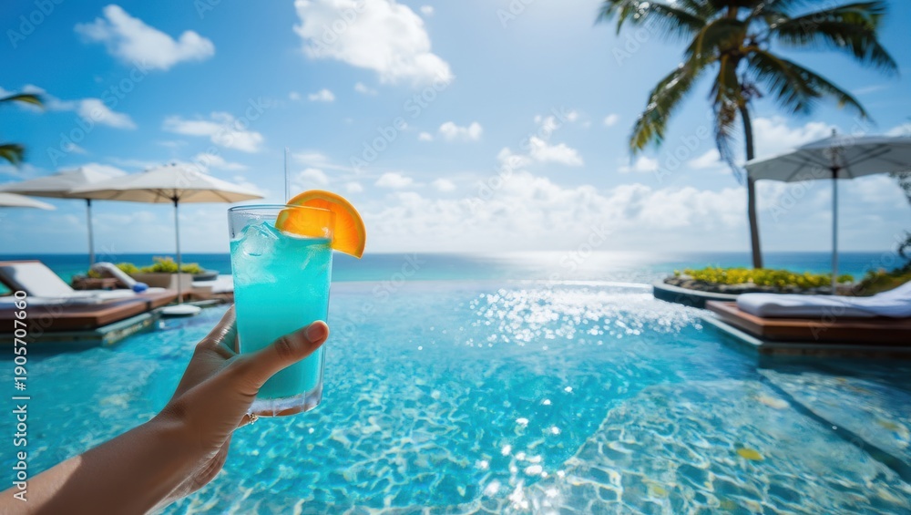 Fototapeta premium a Blue Lagoon cocktail or a similar blue, orange-flavored drink featuring Blue Curaçao liqueur