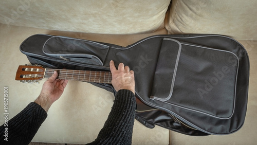Removing the guitar from the case