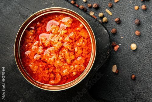 Tuna in tomato sauce canned fish seafood tasty snack fresh gourmet pescetarian diet food background on the table rustic food top view copy space keto and paleo diet vegetarian