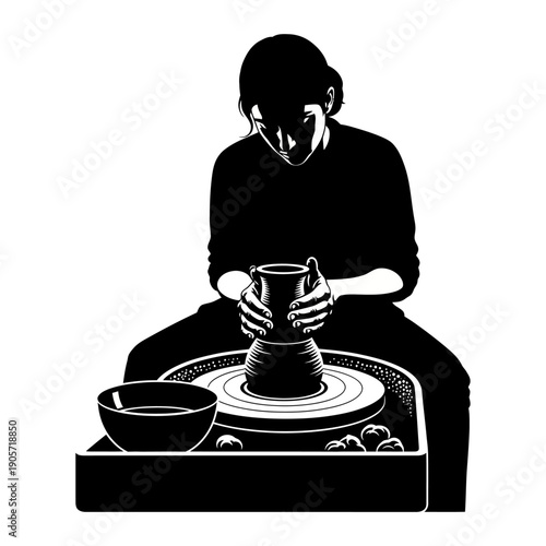Silhouette of a pottery artist shaping clay on a wheel