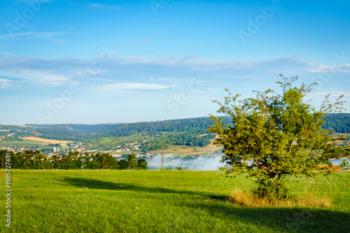 Fotografie Green landscape with Arry village, Lorraine France.