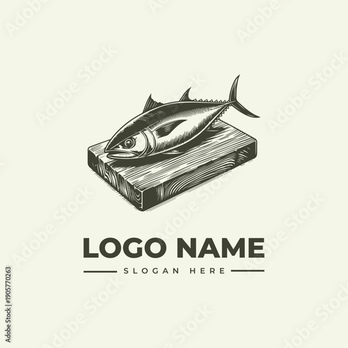 Black and white vintage-style woodcut illustration of a tuna fish on a wooden block with a placeholder logo and slogan in a classic, monochromatic design.