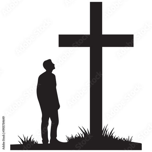 Silhouette of man standing before large cross in serene landscape