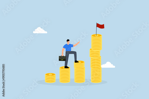 Financial goal, businessman steps up to climb stack of coins with aim of reaching the target flag